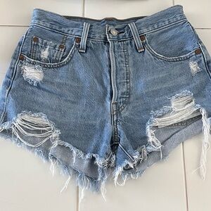 Levi's cut off Jean shorts. Size 25" waist. Distressed, button fly